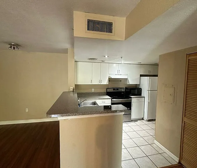 5035 Wiles Rd #203 — Photo 27