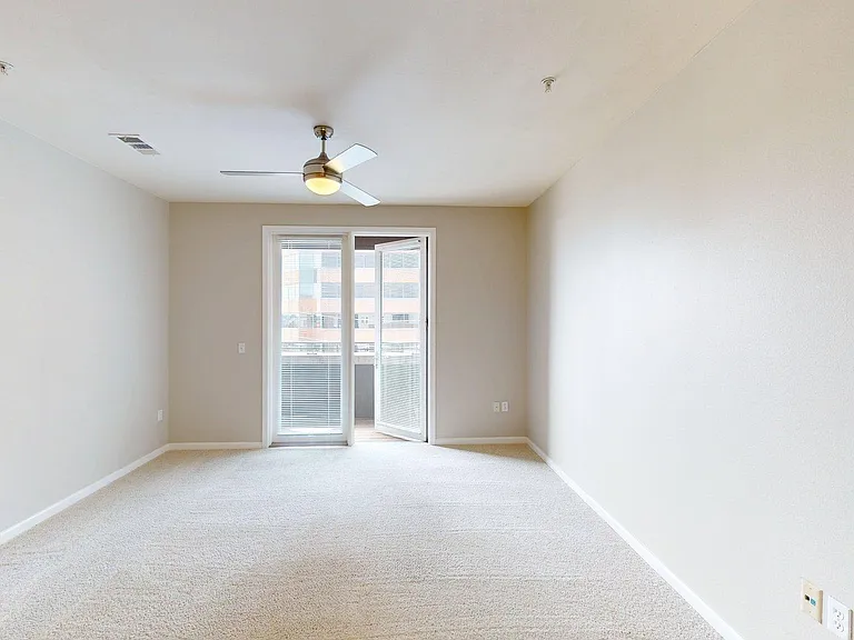 Apartment Living Room with Carpet and Patio/Balcony.