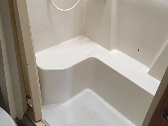Shower with shampoo ledge