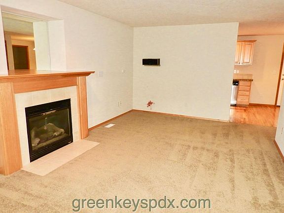 Living room with view to kitchen