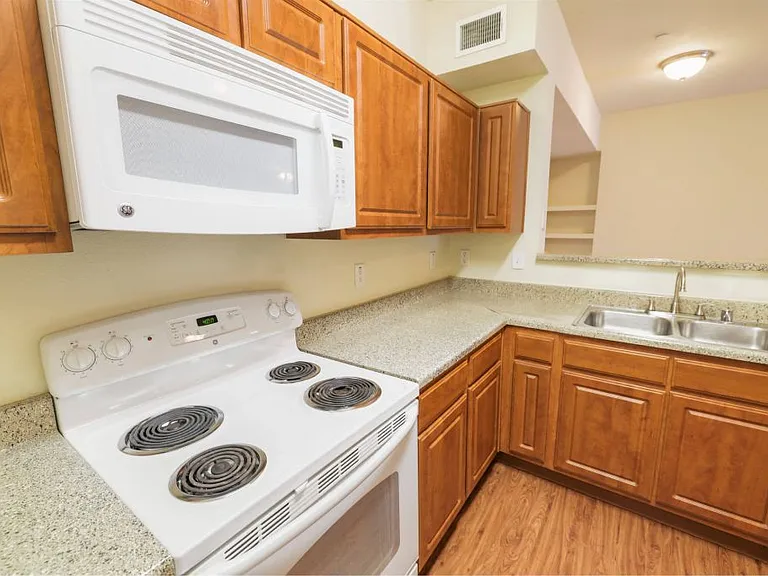 Kitchen with microwave at Stonehaven Apartments in Houston, TX