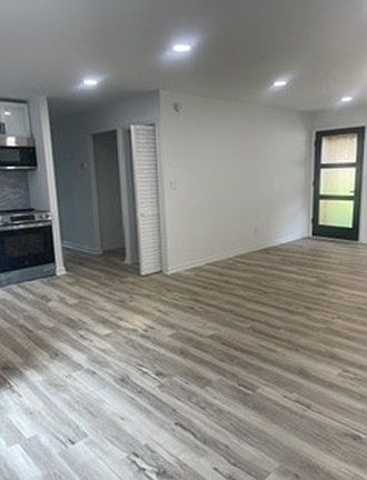 Open Concept Living Room, Kitchen and Hallway View