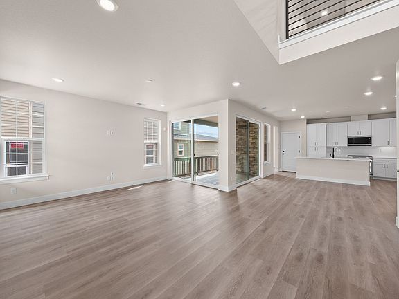 8729 Whiteclover St Lot 105 Harmony at Sterling Ranch by Trumark Homes Living Room