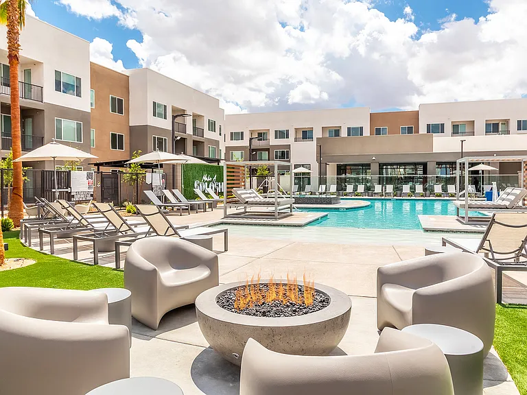 Relax at night by the poolside firepit