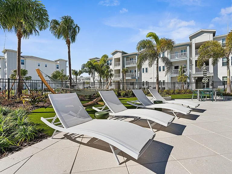 Relax in style at Palm Paradise Apartments, where comfort meets modern living.