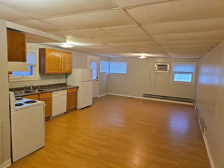 Spacious Apartments in the Heart of the Village — Photo 31