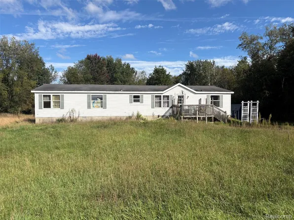 9381 21 Mile Rd, Sand Lake, MI 49343