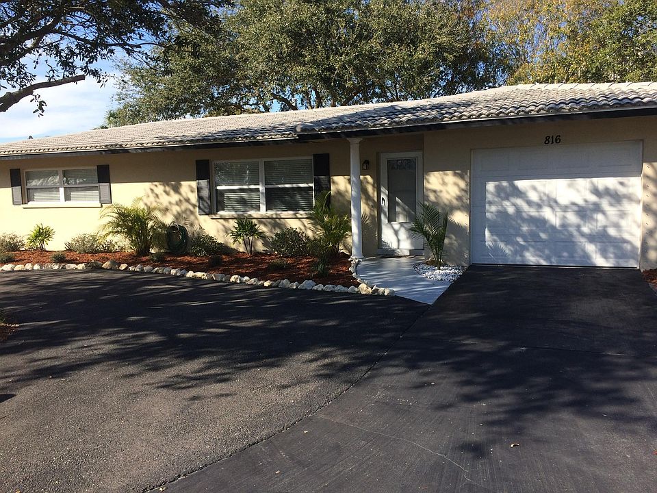 Your New Home Complete With Yard Care, and Hurricane Shutters!