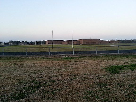  Walk out back yard gate to the elementary and middle school.