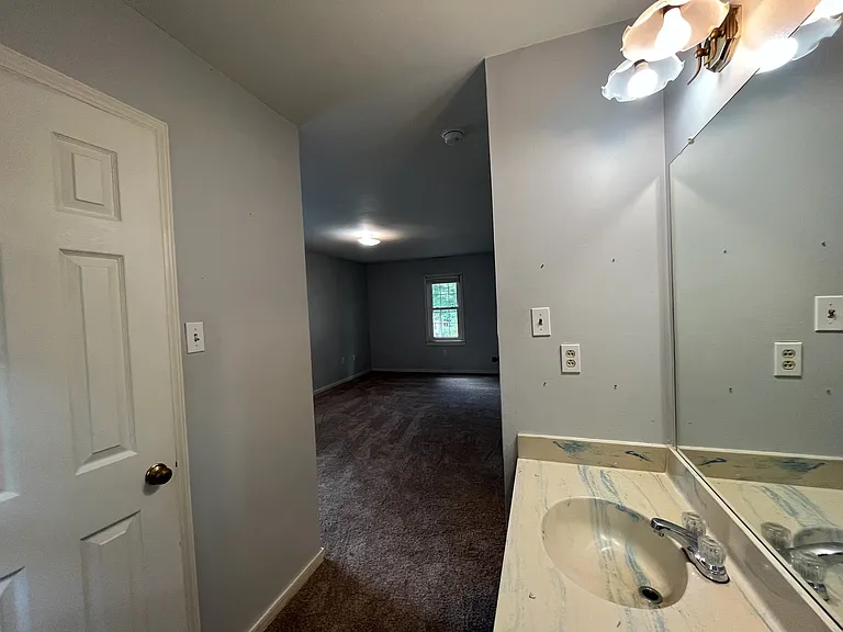Vanity area located in Primary Bedroom