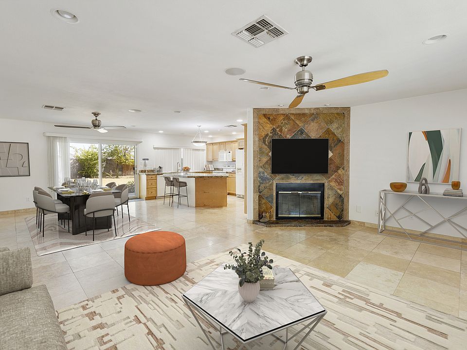 Great view of the open floor plan between the living room, dining area and kitchen!