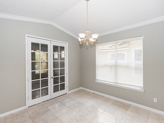 AFTER FOYER WALK DOWN AND TO THE RIGHT YOU WILL SPOT A LARGE DINING AREA