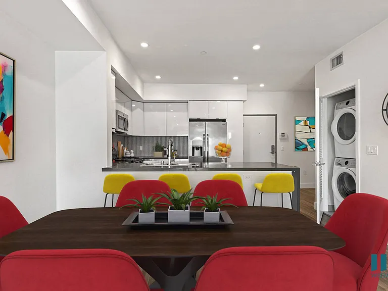 Open-Concept Kitchen with Countertop Bar and Dining Area