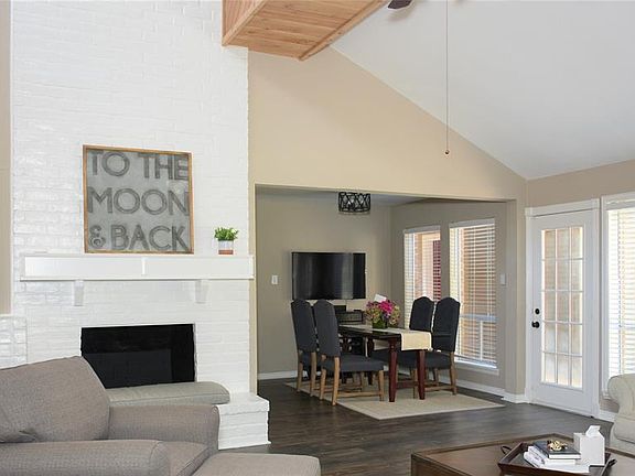 Breakfast room is nestled off the living room and next to the kitchen. Beautiful granite top dry bar.
