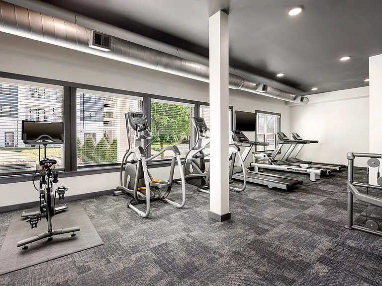 24-Hour Cardio and Strength Training Fitness Center featuring Peloton Bike, Hub Training System, Water Rower, Free Weights and More!