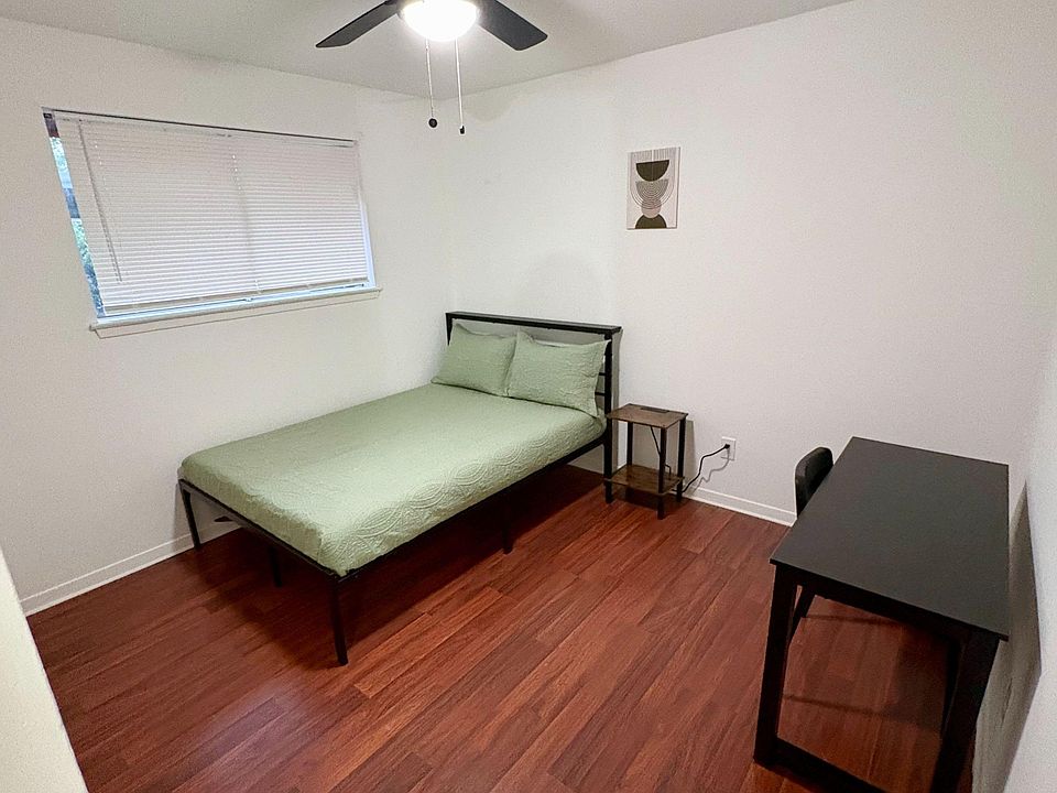 Room 1 features a full size bed, reach-in closet, bedside table with a charging station, and a work station.