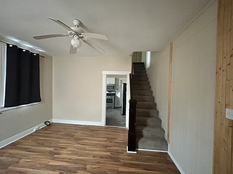 staircase upstairs from living room