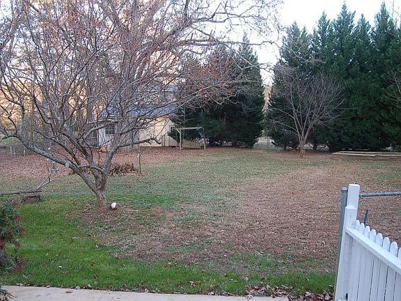 View of a portion of the back yard from the drive