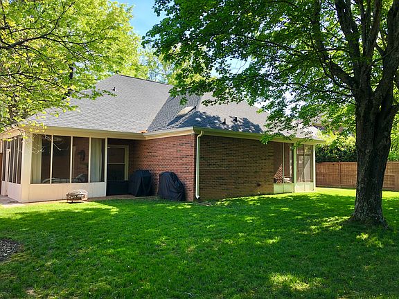 Back shaded fenced yard 