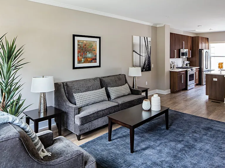 Townhome Signature Collection Living room with hard surface plank flooring throughout