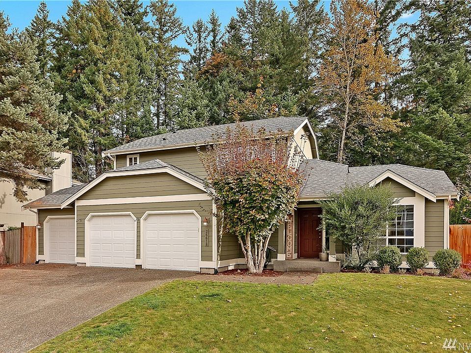 Lovely home in sought after Wilderness Grove on oversized 1/3 acre lot with beautiful green treed privacy in the backyard.