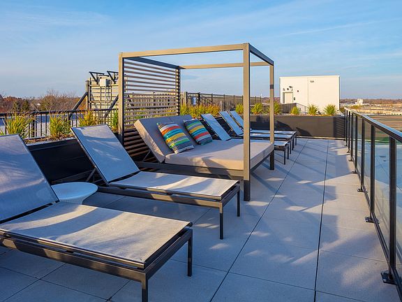 Rooftop sun deck with sunset views