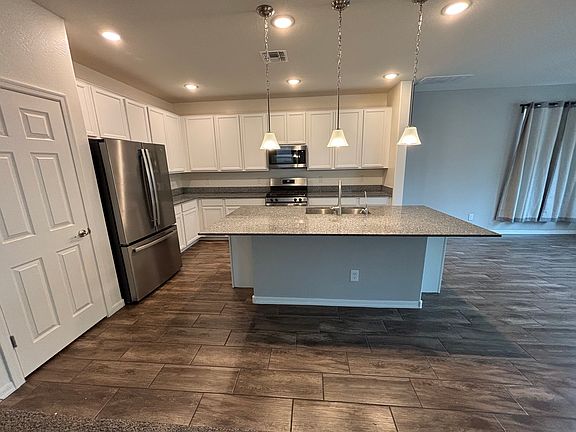 4th image of 8866 W Fleetwood Ln
