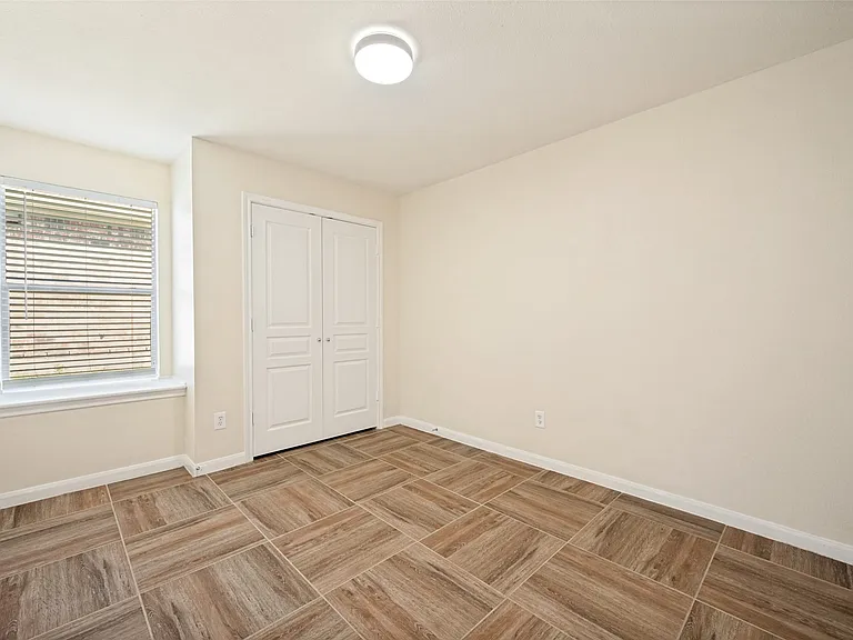 Spacious bedroom with window sear
