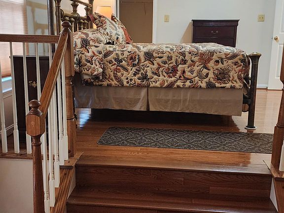 Bedroom. Step down to sitting area. Can be use for an office.