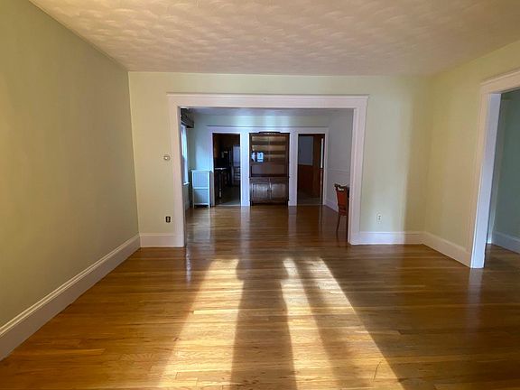 View of living room into dining room, perfect open space for entertaining.