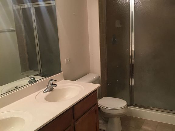 5th image of 3501 Wellington Ct Unit 406