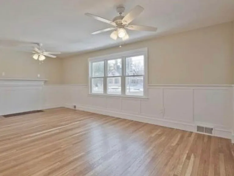 Shared living room. Will have a large couch, a big screened television.
