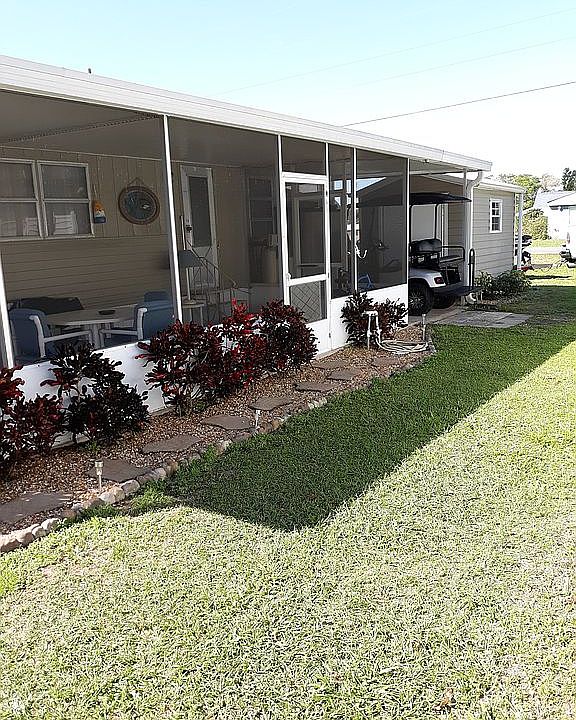Side view & porch entry.