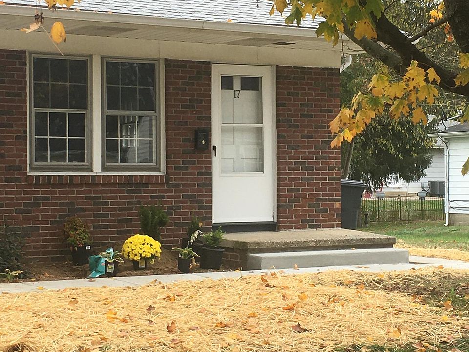 Right half (south) of duplex, brick front, new deck in side yard.