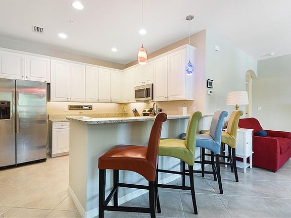 4th image of 9072 Covina Dr N Unit 5503