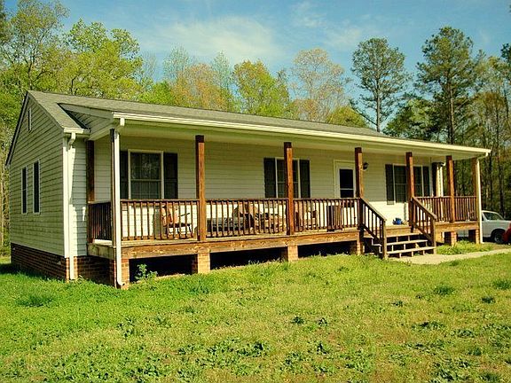Front View of Home with Country Full Front Porch