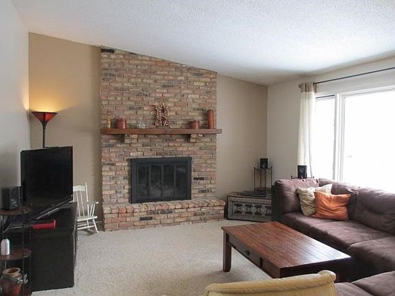 Cozy living room with gas fireplace.