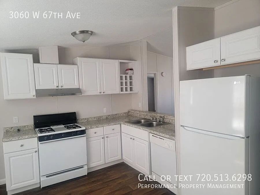Building Photo - 3060 W 67th Ave