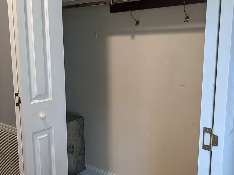 Closet/storage off of the front entrance and intake for hvac