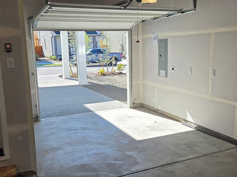 One car garage with plug for hybrid or electric vehicle