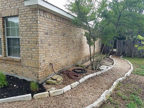 Gravel Side Paths. Low Maintenance 4-Sides Masonry and Hardi Siding.