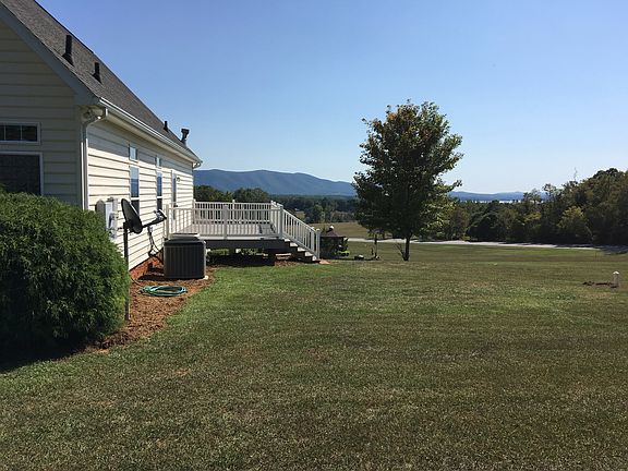 Back of home, deck, yard