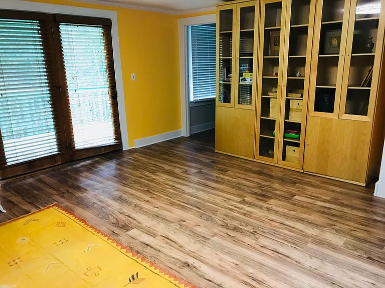 Living Area, doors to the deck on the left (cabinet no longer present)
