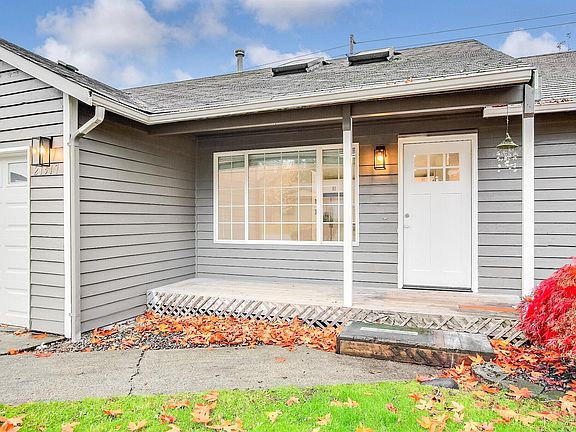 Front door with charming patio