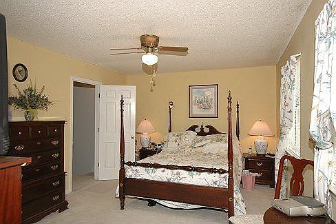 Master bedroom has sitting area.