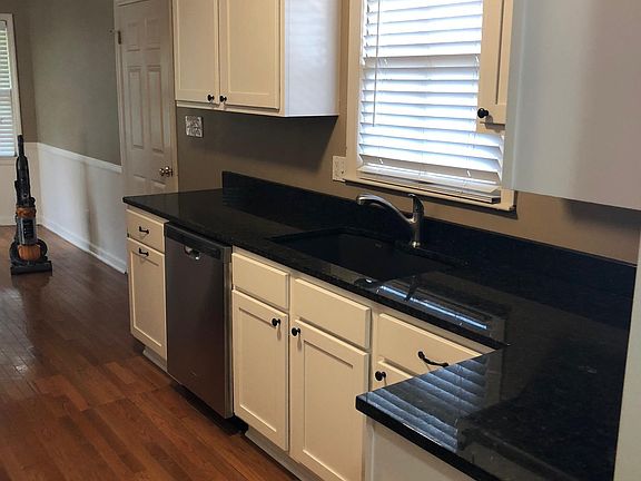 Stainless appliances, wood floors throughout first floor