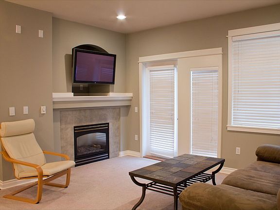 Friendly Gatherings in the Living Room around the Fireplace