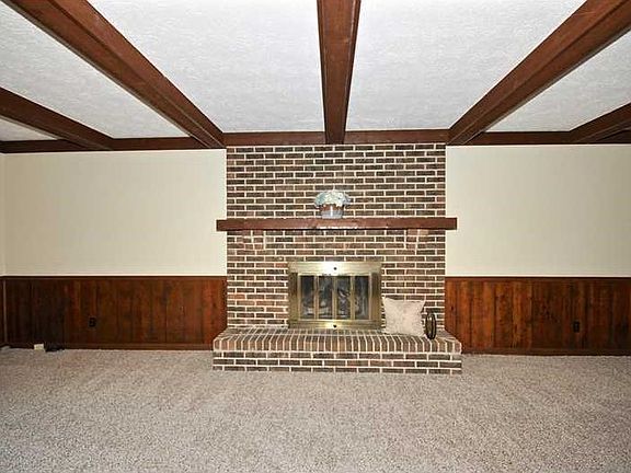 Fireplace. Brick fireplace with gas log.