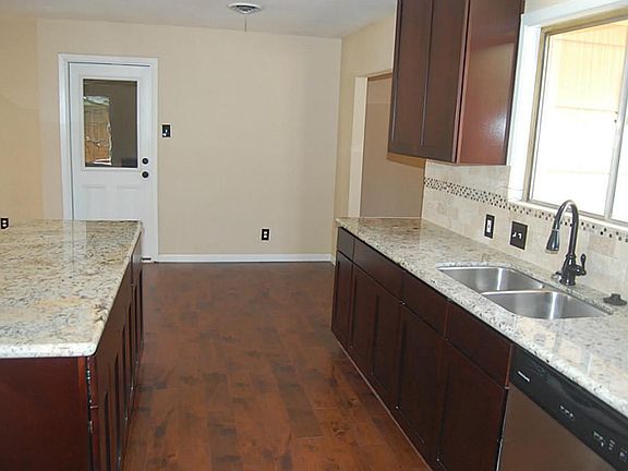 Living Room is open to the beautiful Chef's kitchen.  Pardon our sawdust.  We expect work to be completed and cleaning crew by March 10th.