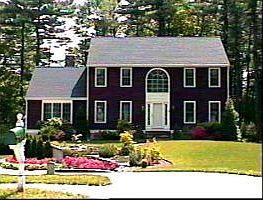 Perfect 10! Mint condition center entrance colonial situated on well landscape